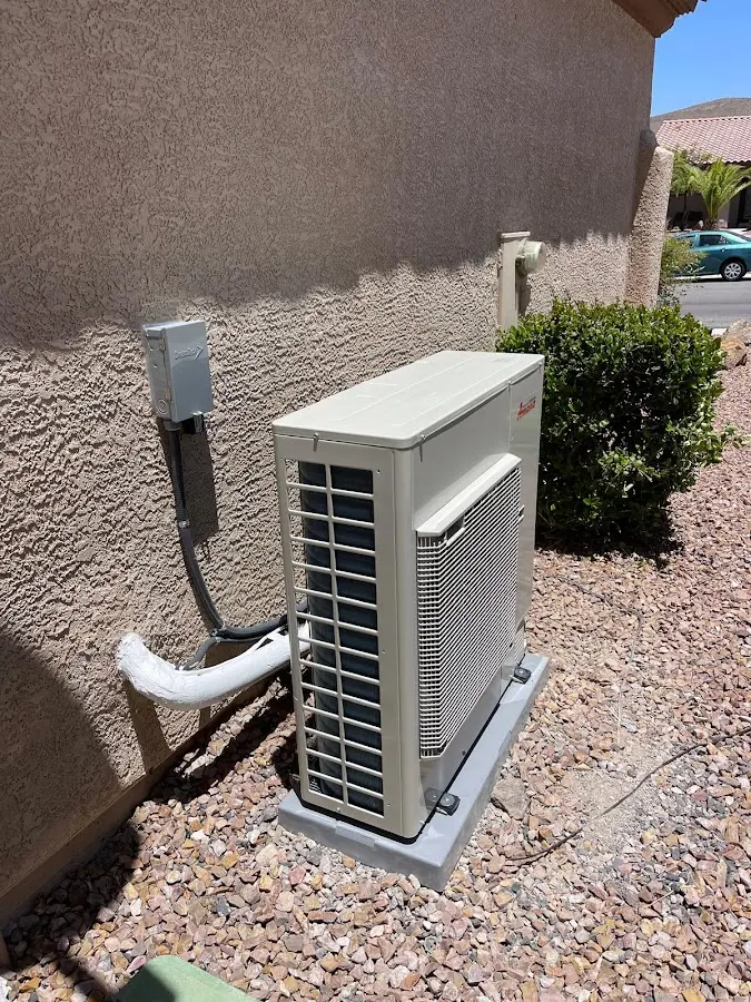 Residential air conditioning condenser unit in Handy